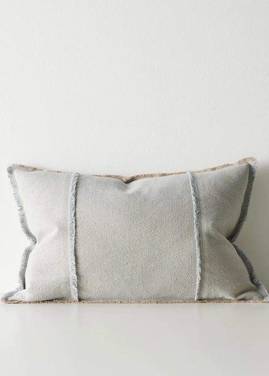 Gray pillow with a textured pattern on a white background