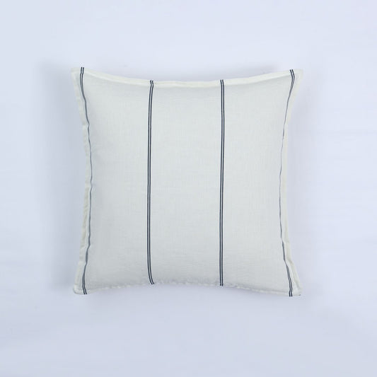 White pillow with black stripes on a white background