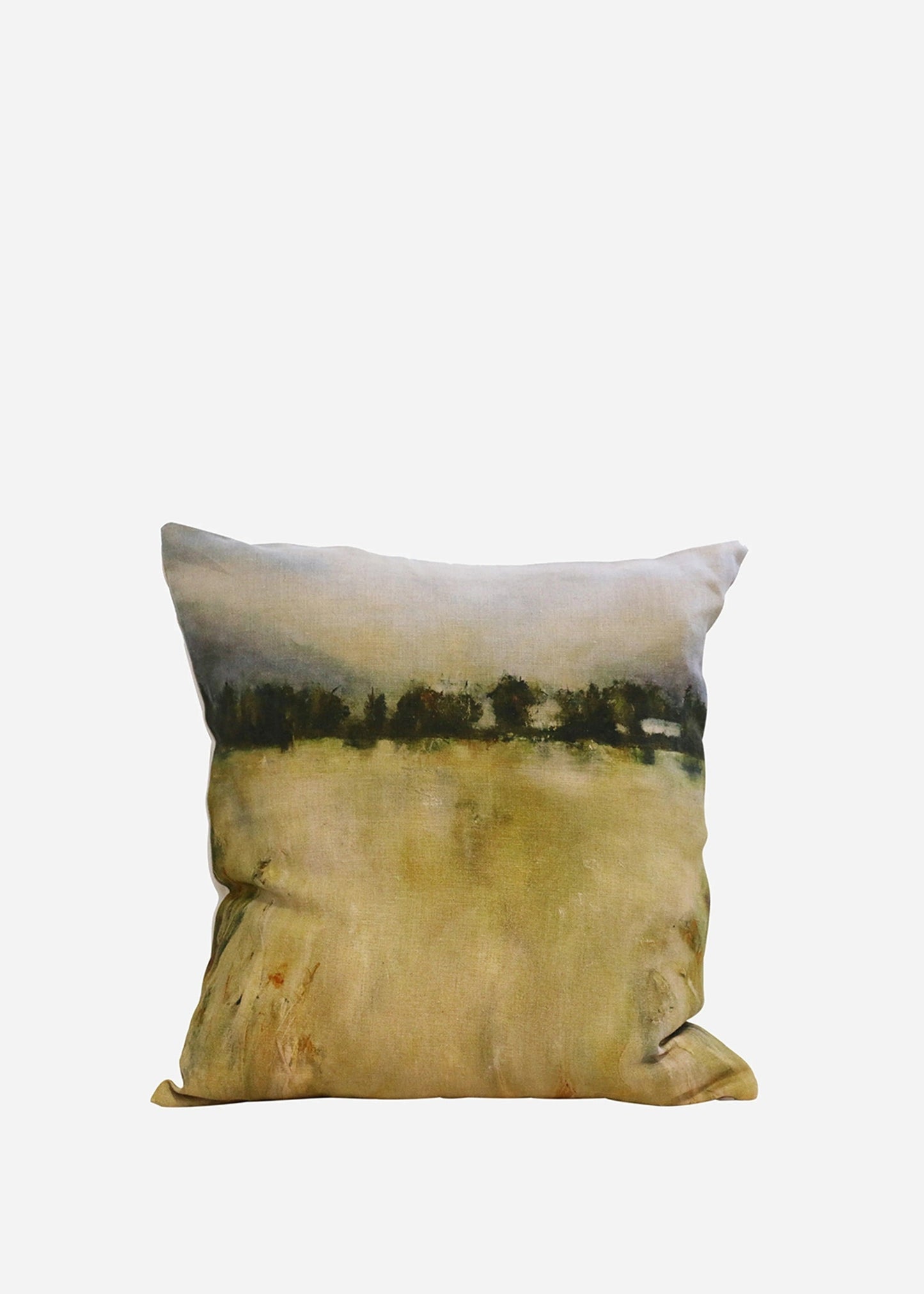 A square decorative throw pillow featuring an impressionist landscape print with a golden field and dark trees under a pale sky, shown against a plain light gray background.