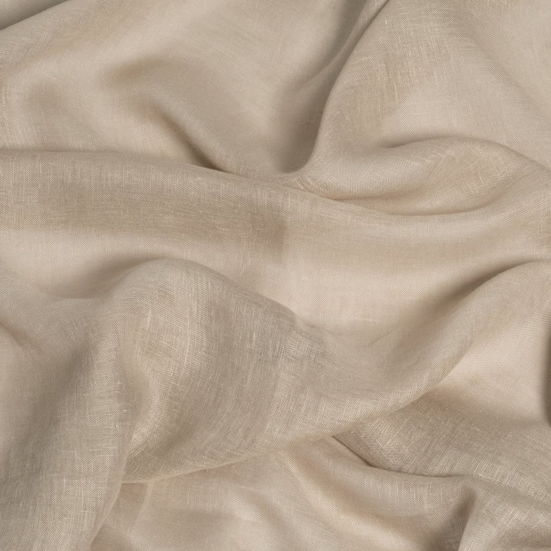 Beige fabric with folds and texture