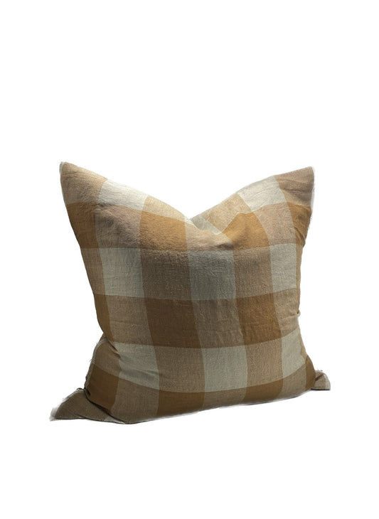 Plaid pillow with brown and beige colors on a white background