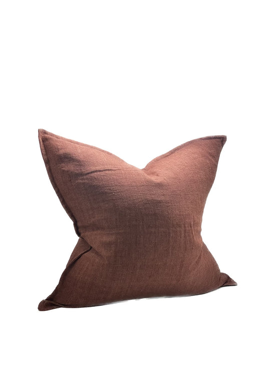 Brown pillow on a white background