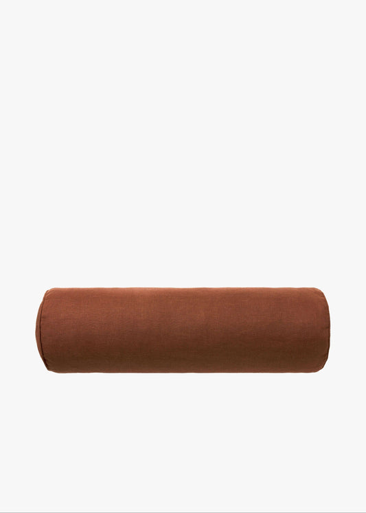Brown cylindrical object on a white background