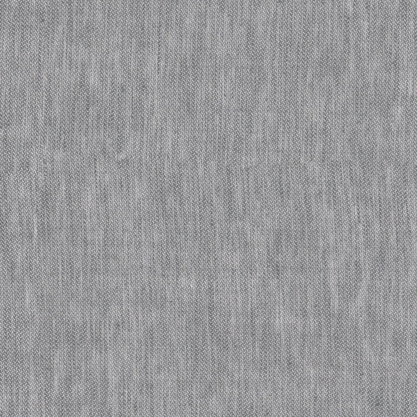 A gray linen duvet cover on a bed, showing a soft, wrinkled texture characteristic of linen fabric.