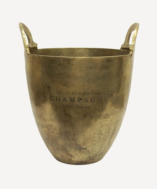 Brass champagne cooler with 'Champagne' text on a white background