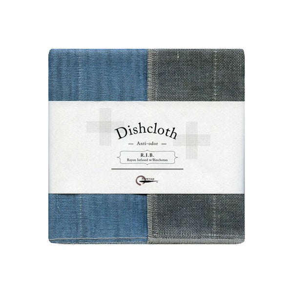 A two-tone dishcloth in blue and gray, with a textured surface, packaged in a box with the text 'DISHCLOTH AQUA' and the brand name 'RIN'.