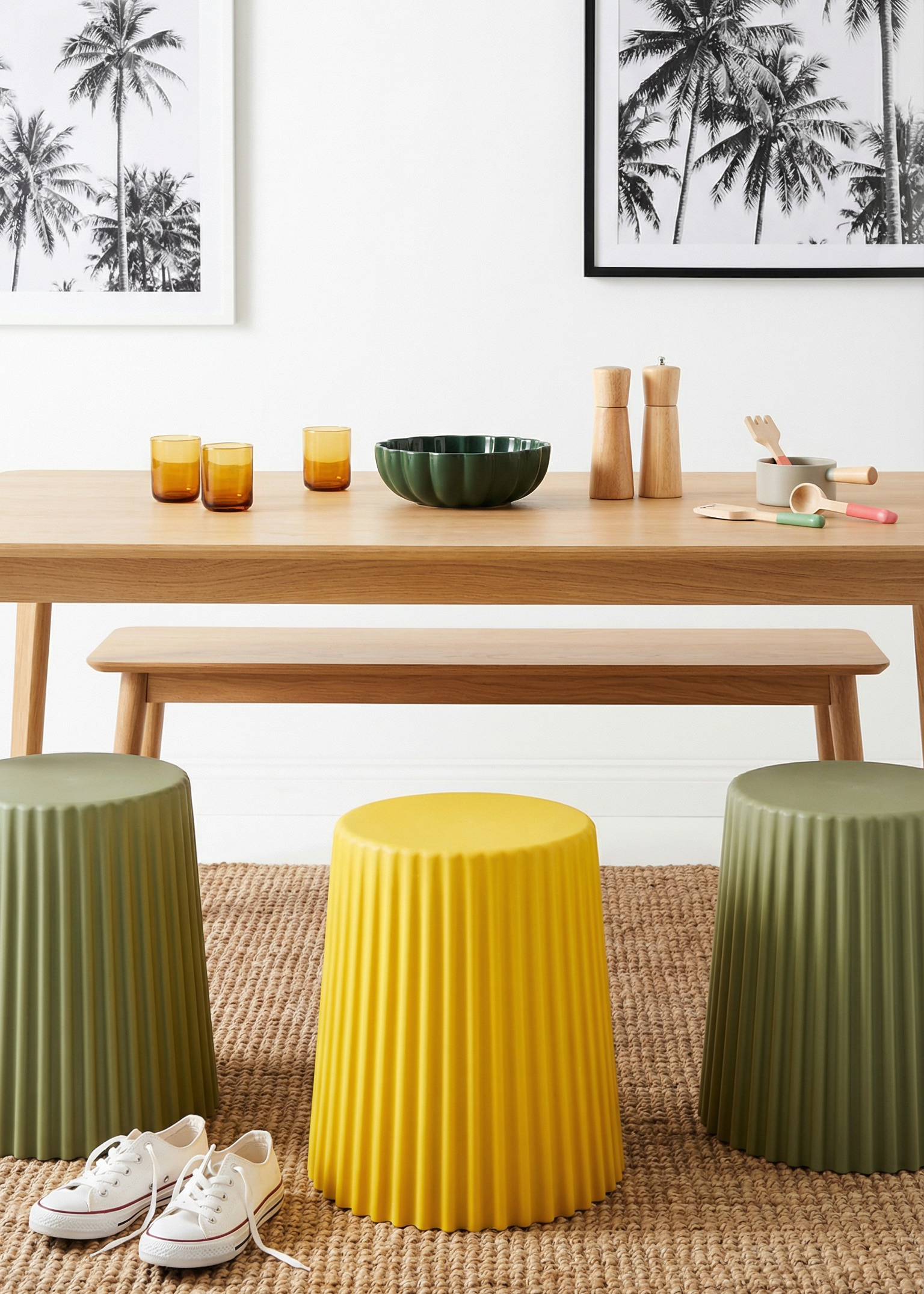 Colorful stools in a living room setting with a table and decor.