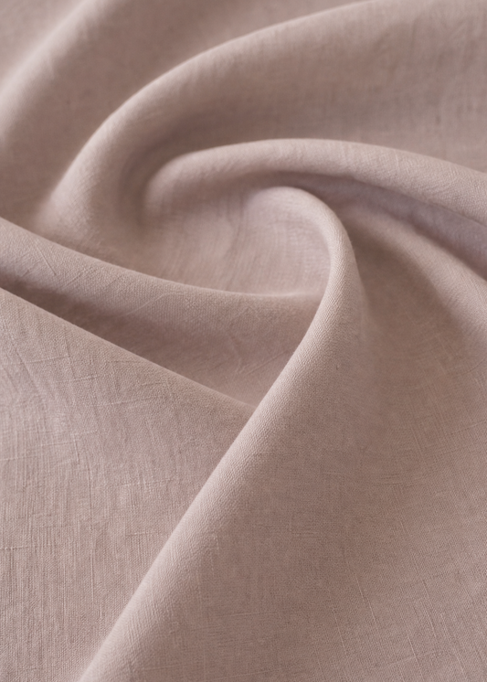 Close-up of beige fabric with folds