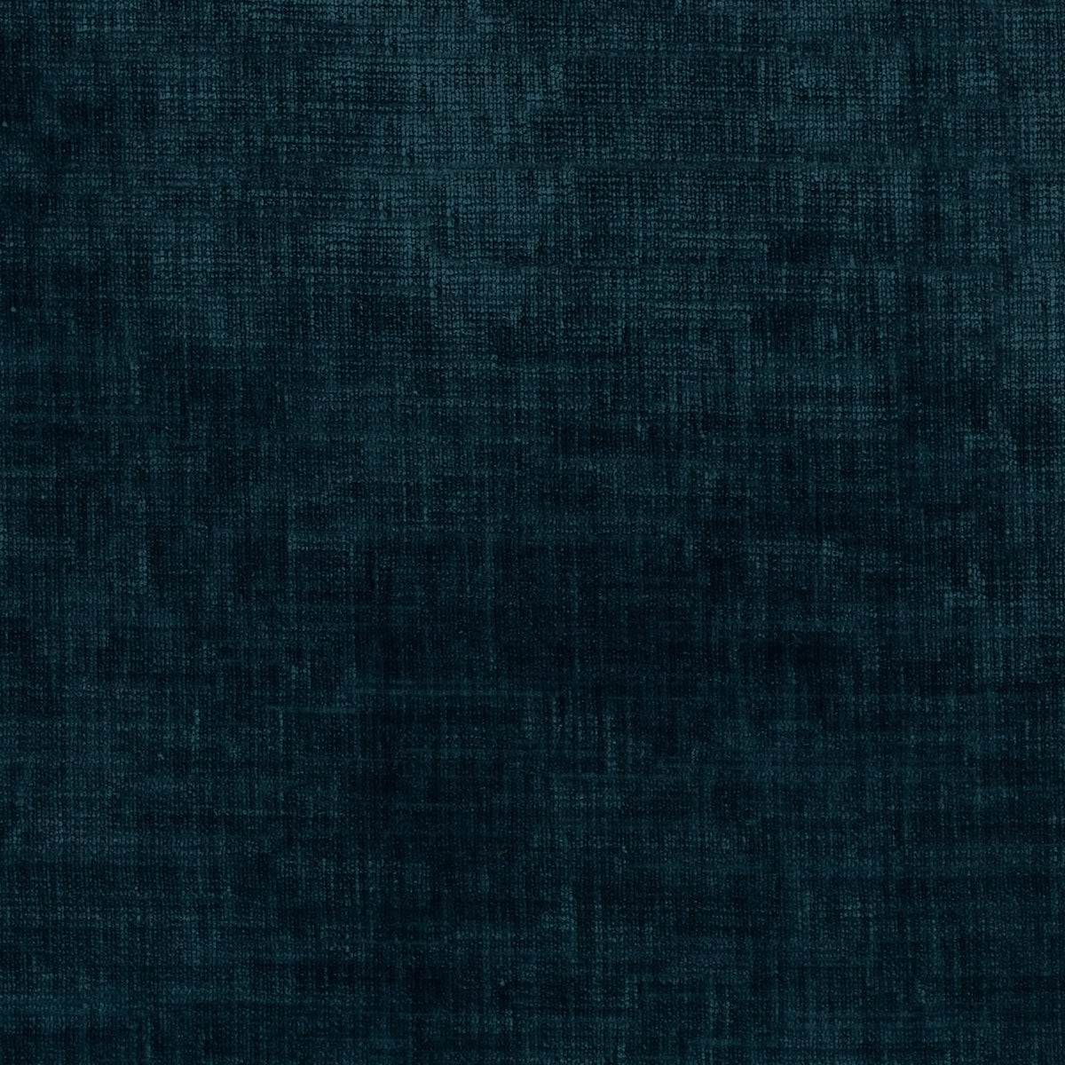 A close-up of dark teal blue textured fabric with a fine woven or linen-like pattern.