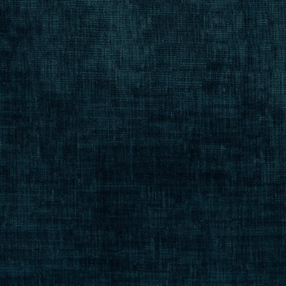 A close-up of dark teal blue textured fabric with a fine woven or linen-like pattern.