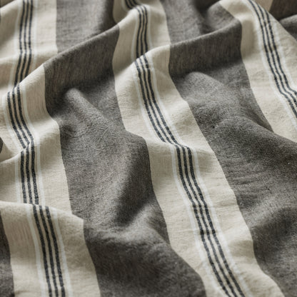 Close-up of a fabric with gray and beige stripes