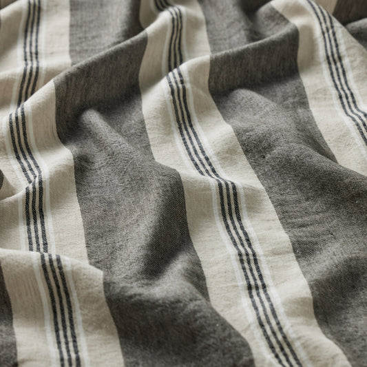 Close-up of a fabric with gray and beige stripes