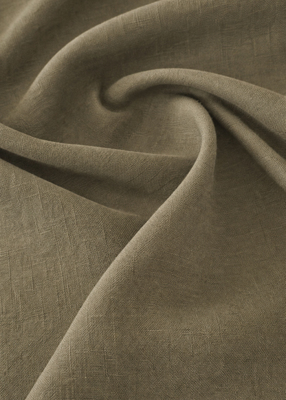 Close-up of brown fabric with folds