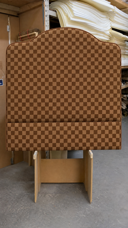 Checkered headboard in a storage or warehouse setting
