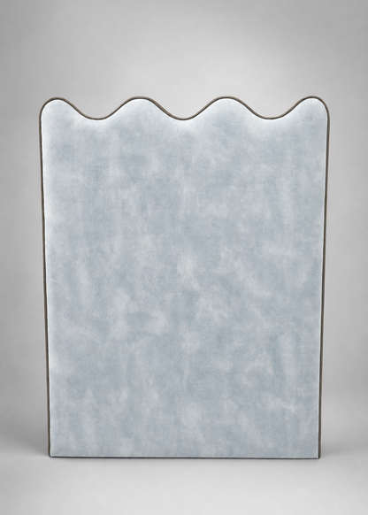 Rectangular mirror with wavy edge on a gray background