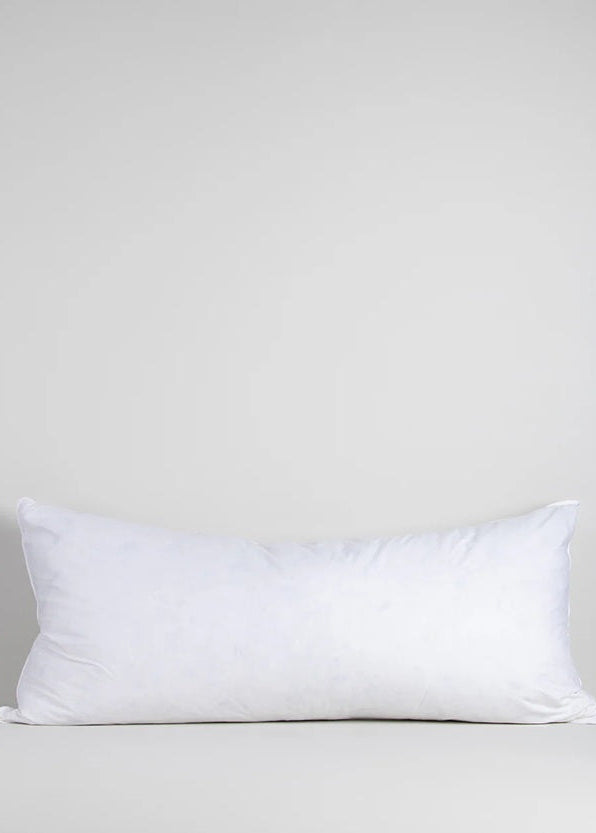 White pillow on a light gray background