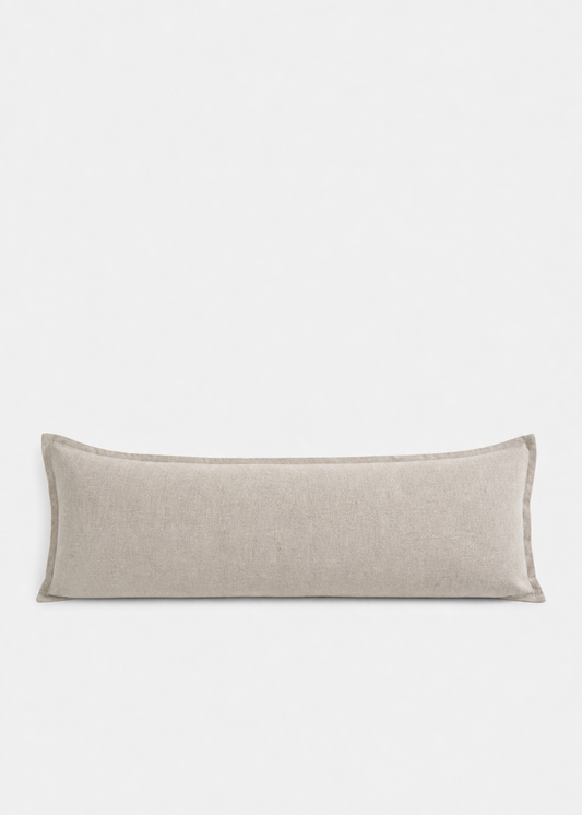 Beige rectangular pillow on a white background