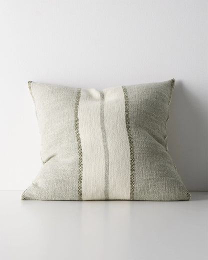 A square throw pillow with a textured linen-like fabric in a light sage green and cream color combination, featuring three vertical stripes with varying widths.