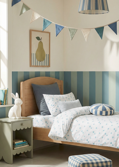 Children's bedroom with striped wall, bed, and decorative elements.