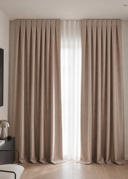 Beige curtains in a room with a light background