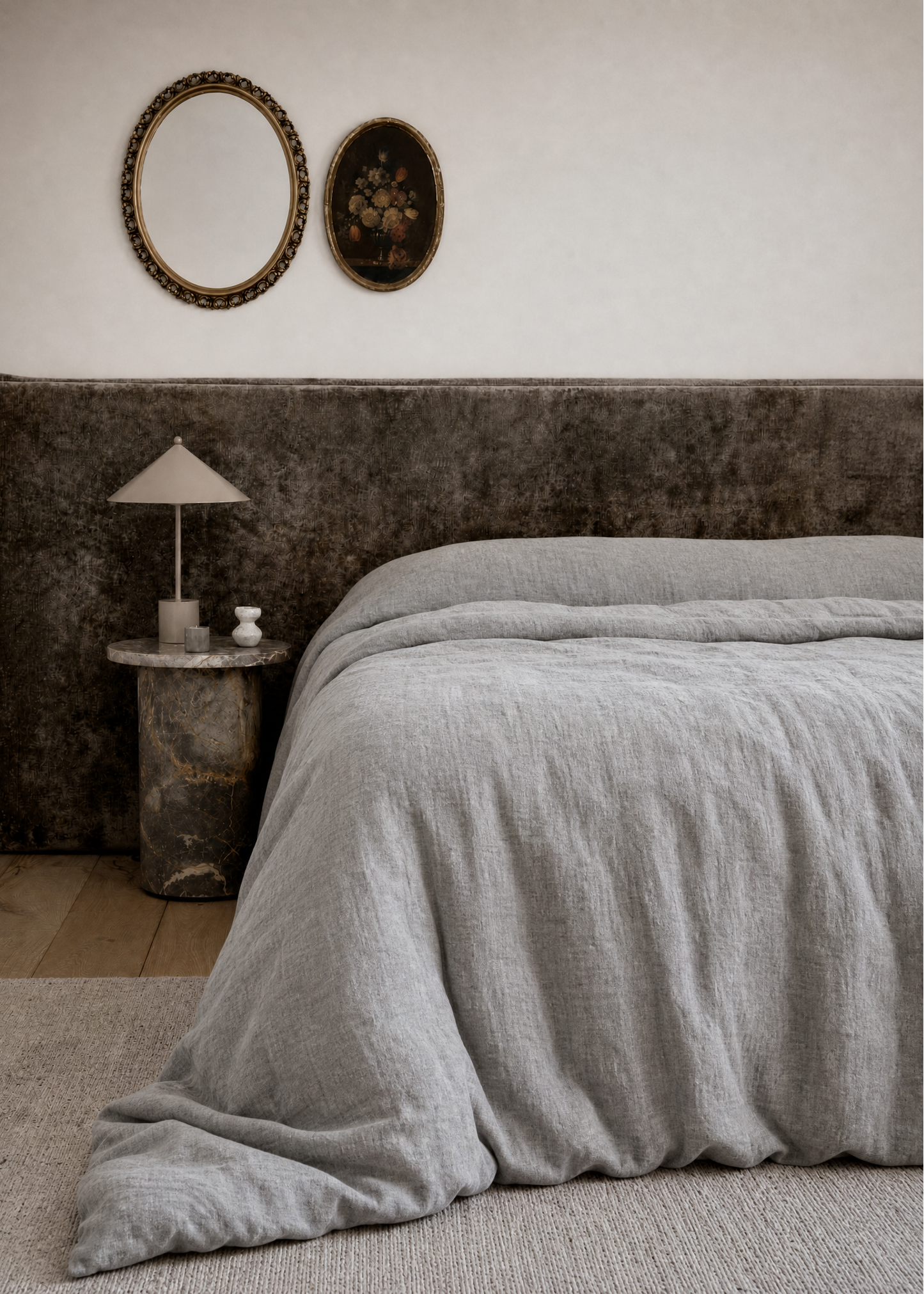 Brown bedspread and pillows with sunlight filtering through a window.