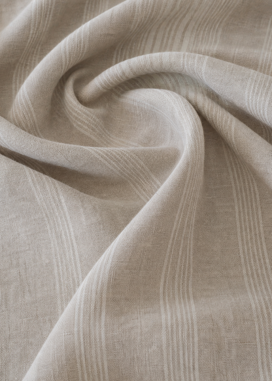 Close-up of beige fabric with visible texture