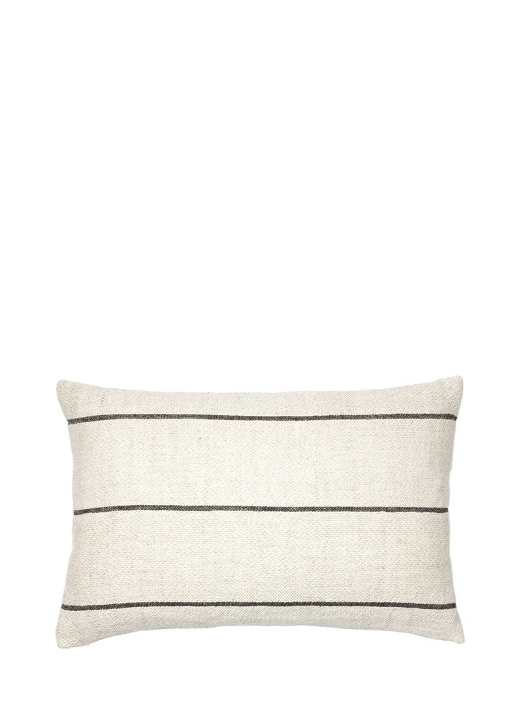 Rectangular pillow with black stripes on a white background