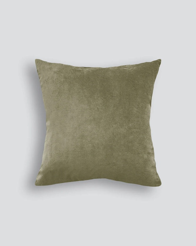 Green cushion on a light gray background