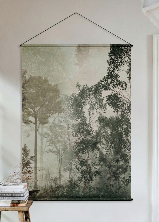 Framed nature print of trees on a white wall