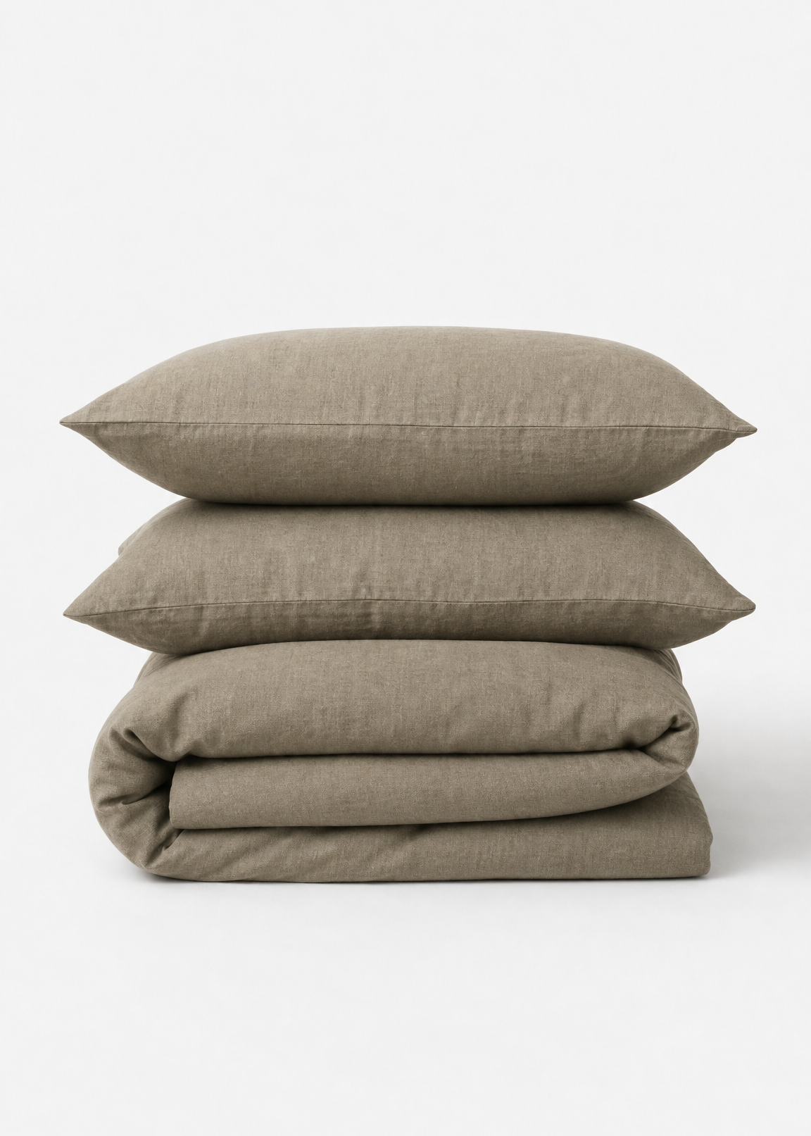 Stack of beige bedding on a white background