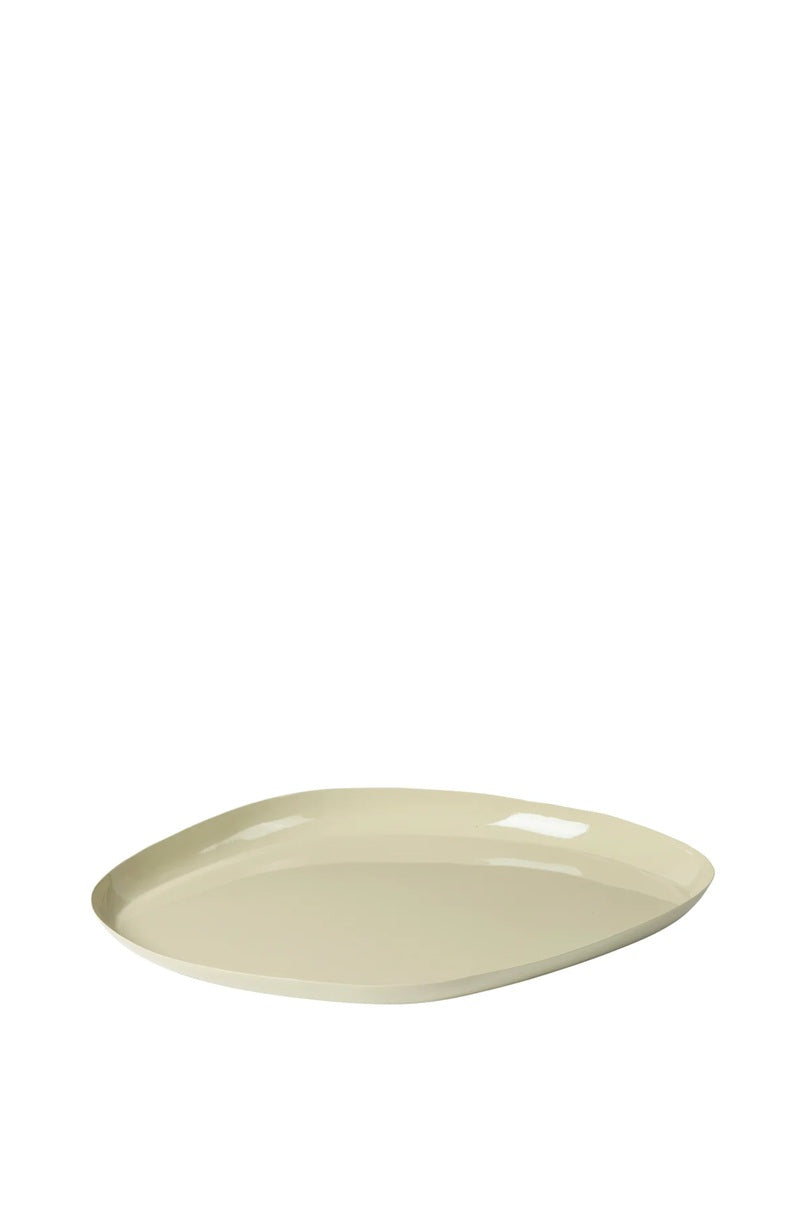 Beige ceramic plate on a white background