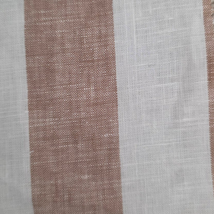 Textile sample with a label on a textured surface