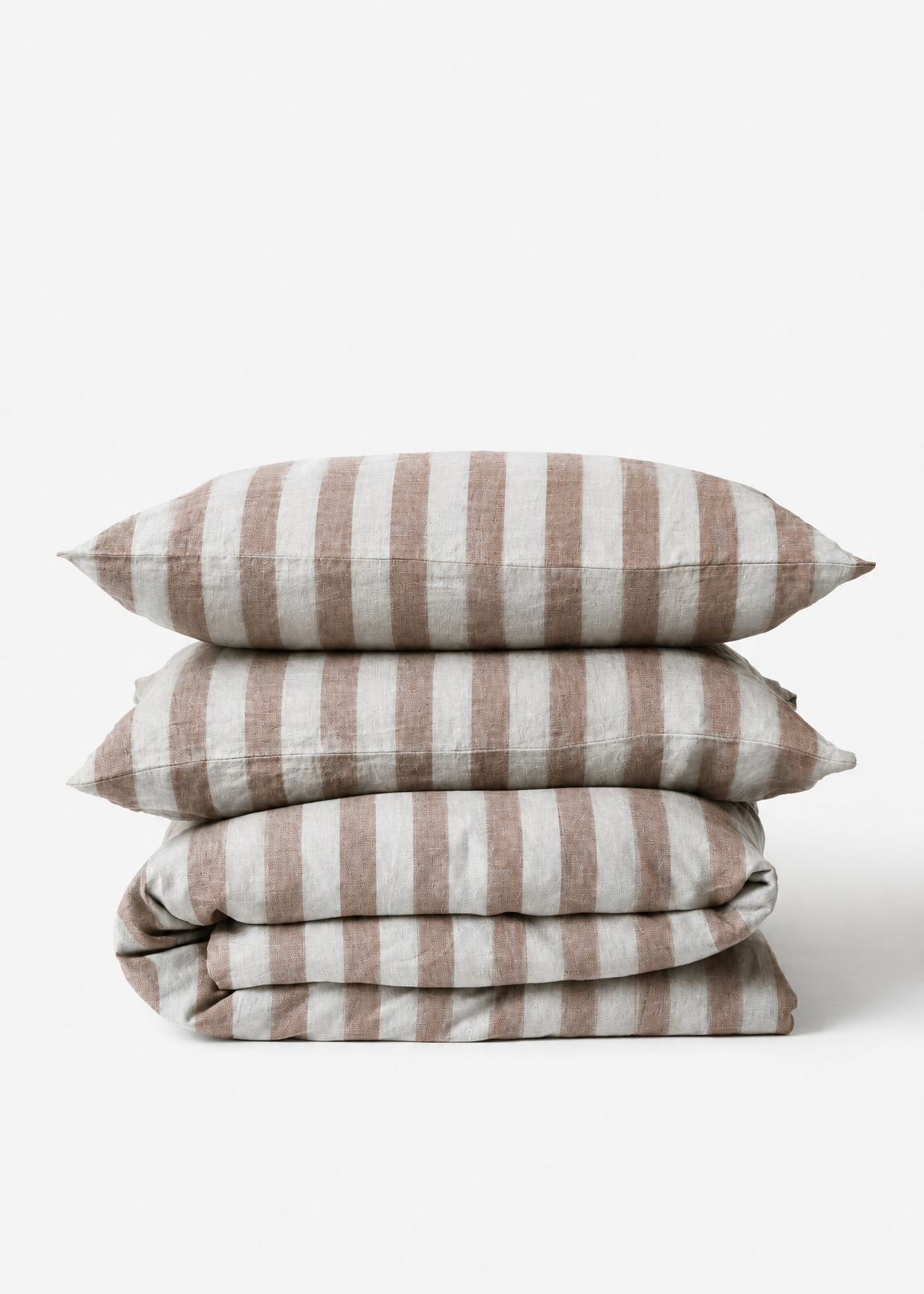 Stack of striped pillows on a white background