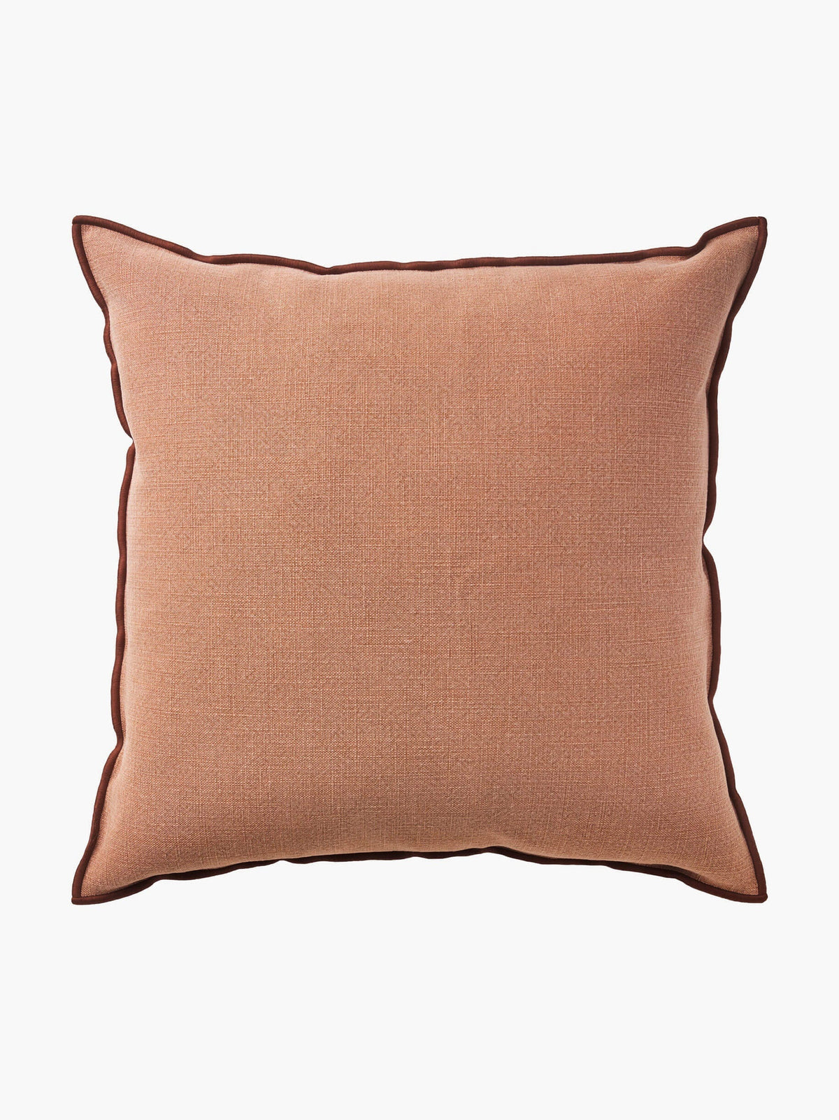 A square throw pillow in a textured dusty rose or terracotta fabric with dark brown piped edges, shown against a plain white background.