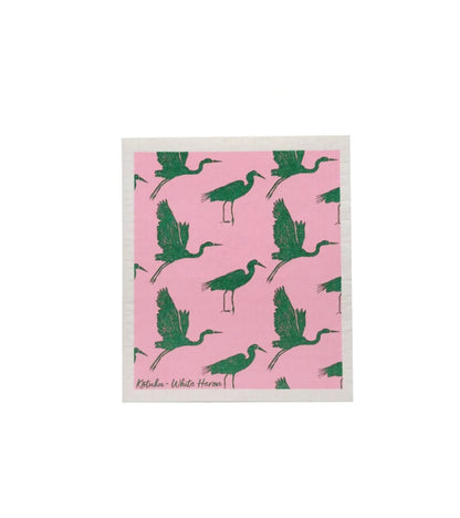 A dish cloth with a pink background and a pattern of green bee silhouettes. The text 'Made in Sweden' is visible at the bottom.