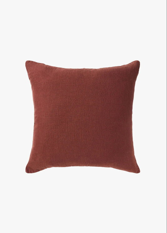 Brown cushion on a white background