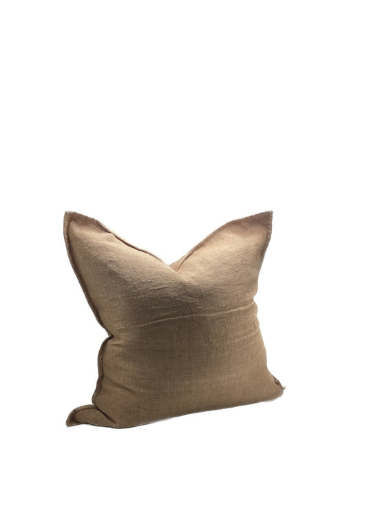 Beige pillow on a white background