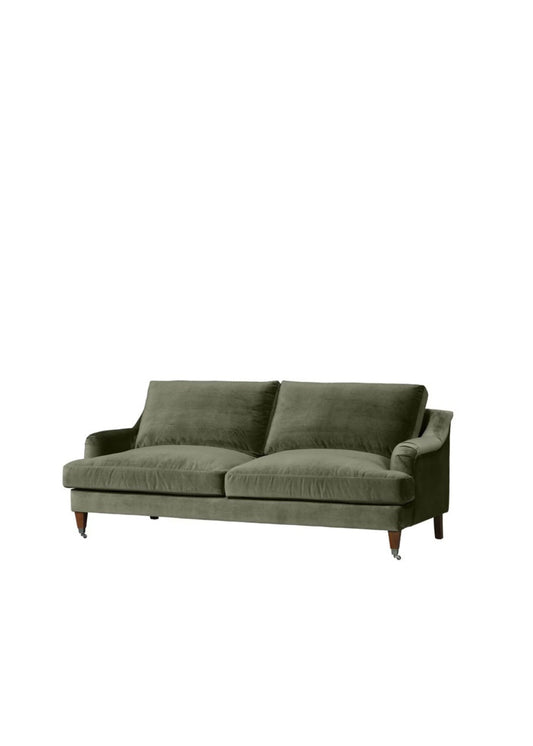 Green sofa on a white background