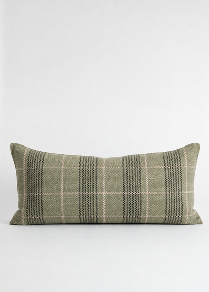 Green plaid pillow on a white background