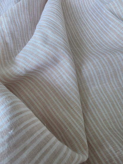 Close-up of striped fabric with a neutral color palette