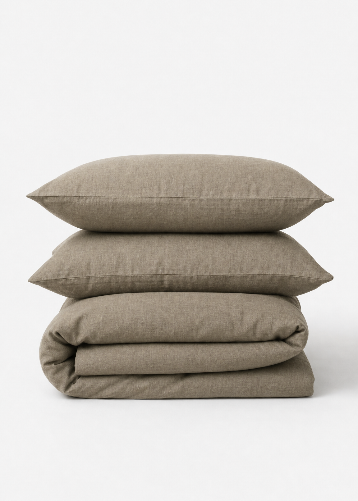 Stack of beige bedding on a white background